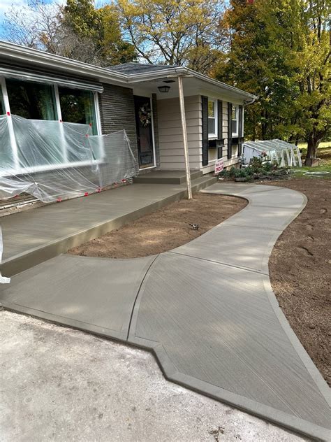 Enhance Your Property With Expert Concrete Sidewalk Installation Ng