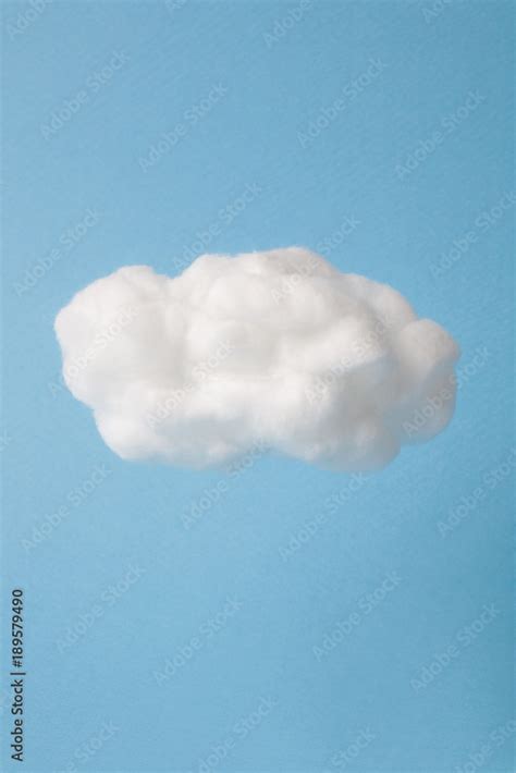 Cloud Made Out Of Cotton Wool On Sky Blue Background Stock Photo