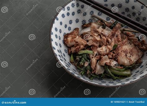 Stir Fried Flat Noodle And Chicken With Dark Soy Sauce And Vegetables