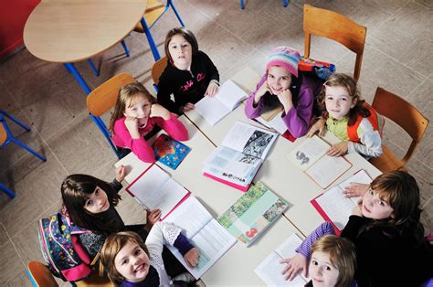 happy children group in school 11925784 Stock Photo at Vecteezy