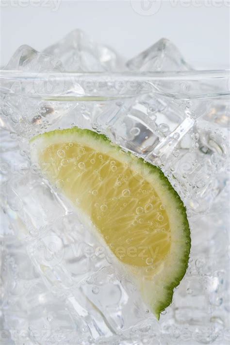 Lime Wedge in Sparkling Water 12519766 Stock Photo at Vecteezy