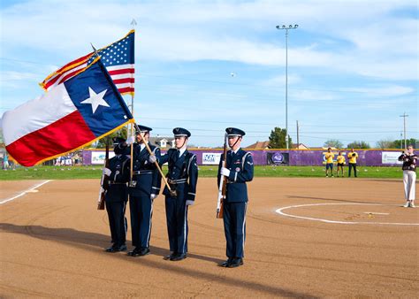 Dyess Leaders Participate In Fastpitch Softball Opening Ceremony