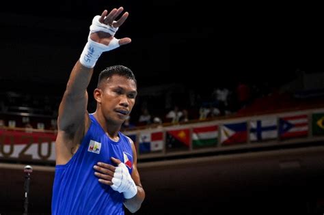 Eumir Marcial dominates in Olympics debut with 1st round stoppage ...