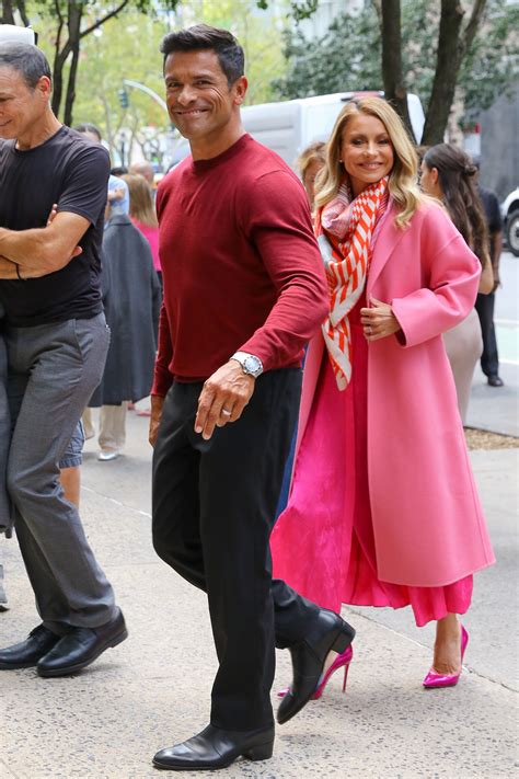 Kelly Ripa And Husband Mark Consuelos Wear Thick Wool Trench Coats And