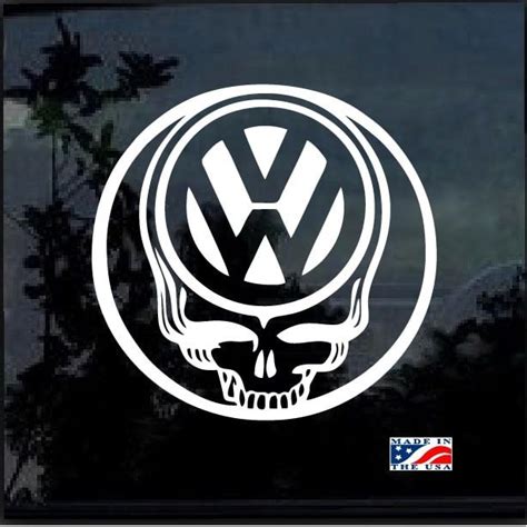 A Sticker On The Side Of A Car That Says Vw With A Skull