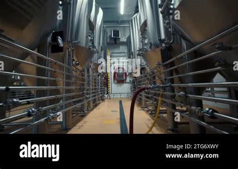 Large Steel Tanks With Beer In Industrial Brewery Plant Stainless