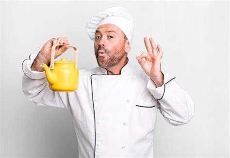 Premium Photo Middle Age Man Chef Concept With A Teapot And Coffee