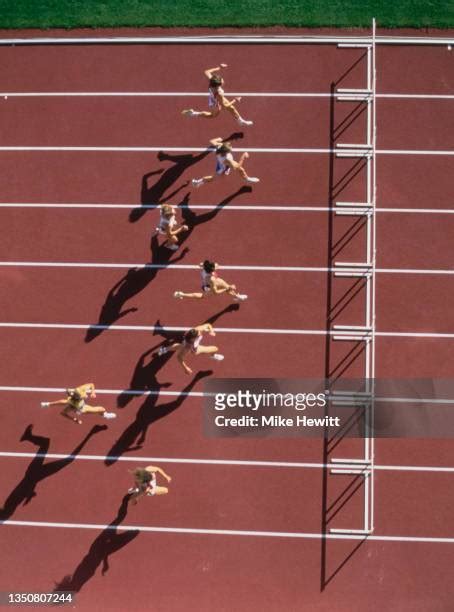 Run Womens 100 Meter Hurdles Photos and Premium High Res Pictures ...