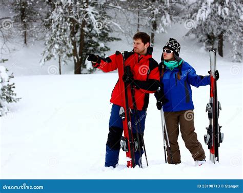 Couple On A Skiing Holiday Stock Image Image Of Male 23198713