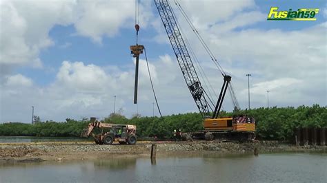 Sheet Pile Installation Work Involves Cranes And Forklifts Youtube