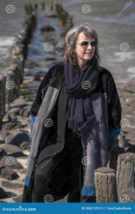 Woman Braving The Cold Day On The Coast Stock Image Image Of Body