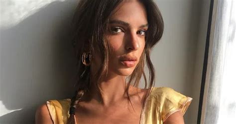 Emily Ratajkowski Shows Off Her Ample Breаsts In A Deep Lace Dress While Out And About