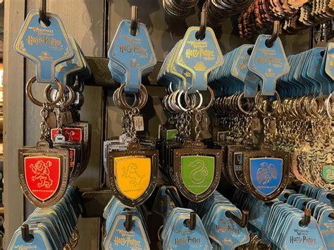 Photos New Harry Potter Hogwarts House Keychains And Pins At