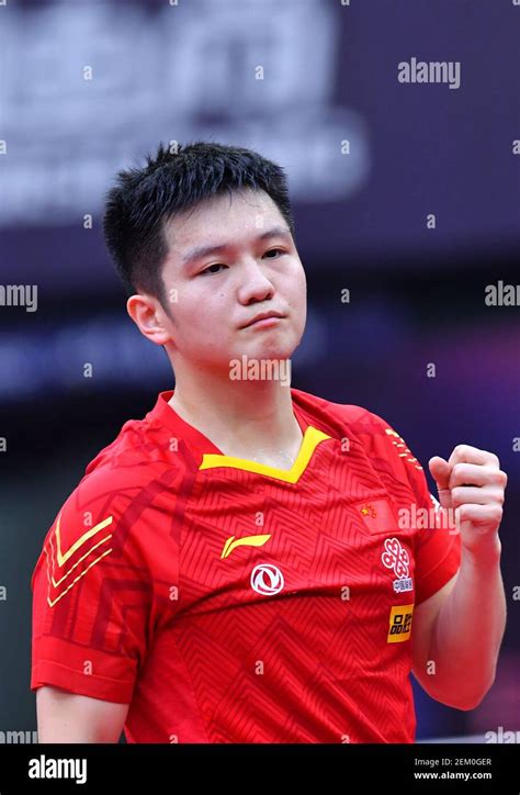 Chinese table tennis player Fan Zhendong plays against South Korean ...