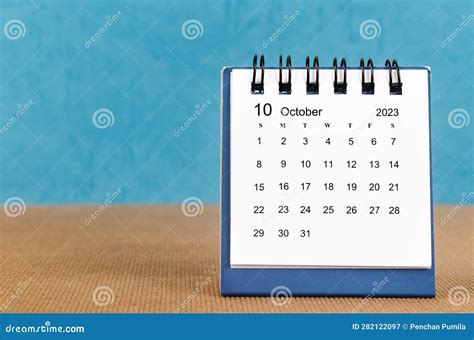 The October 2023 Desk Calendar On Blue Color Background Stock Image