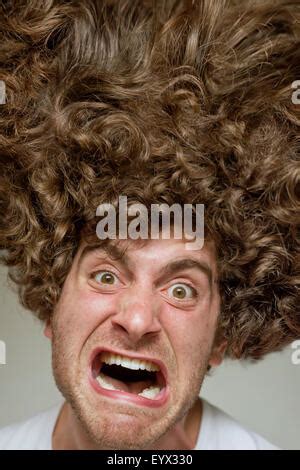 scruffy faced man  messy curly hair afro stock photo alamy