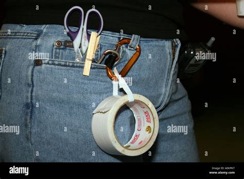 scissors  tape hanging   belt stock photo alamy