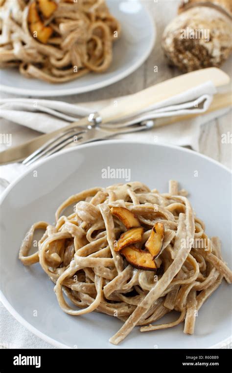 Whole Wheat Tagliolini With Mushrooms Porcini Stock Photo Alamy