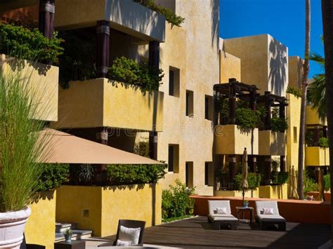 Hotel With Balconies And Wooden Deck In A Resort In Mexico Stock Photo