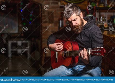 Bearded Guitarist Plays Play The Guitar Beard Hipster Man Sitting In