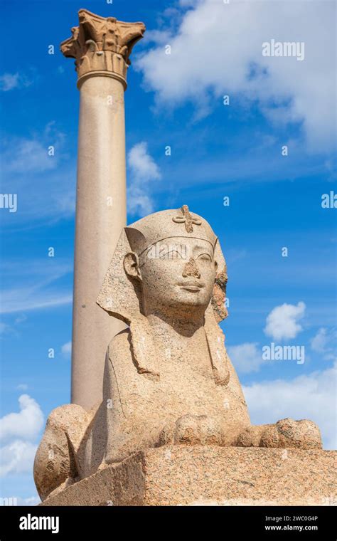 Sphinx And Giant Ancient Pompeys Pillar On Territory Of Serapeum Of