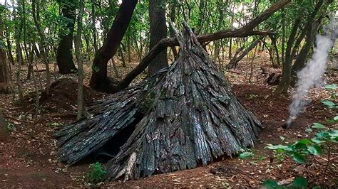 Building Bushcraft Warm Survival Shelter Earth Fireplace Tree Bark