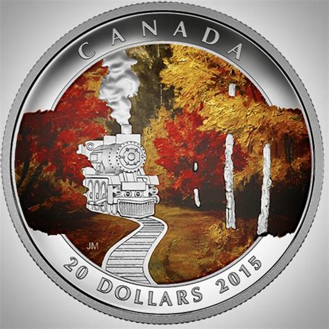 The Canadian Silver Coin Is Shown With An Image Of A Train On It S Track