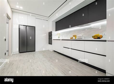 Luxury white and black modern marble kitchen Stock Photo - Alamy