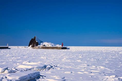 Premium Photo Drift Ice In The Sea Of Okhotsk A Winter Tradition