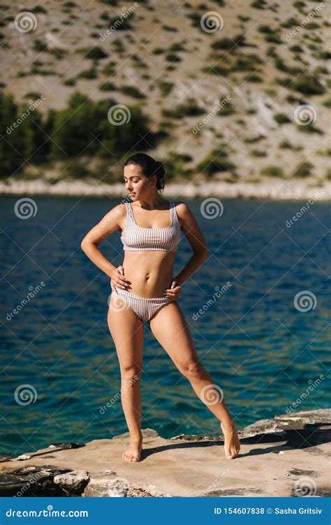 Woman In Bikini Stand In Front Of Beautiful Blue Water Summer Vocation