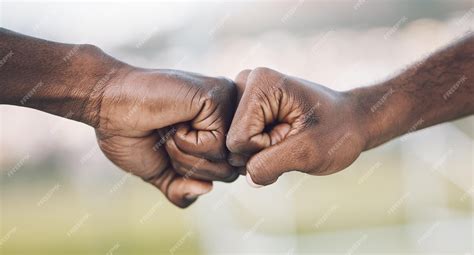 Premium Photo Fist Bump Closeup And Hands Celebrating As Teamwork On