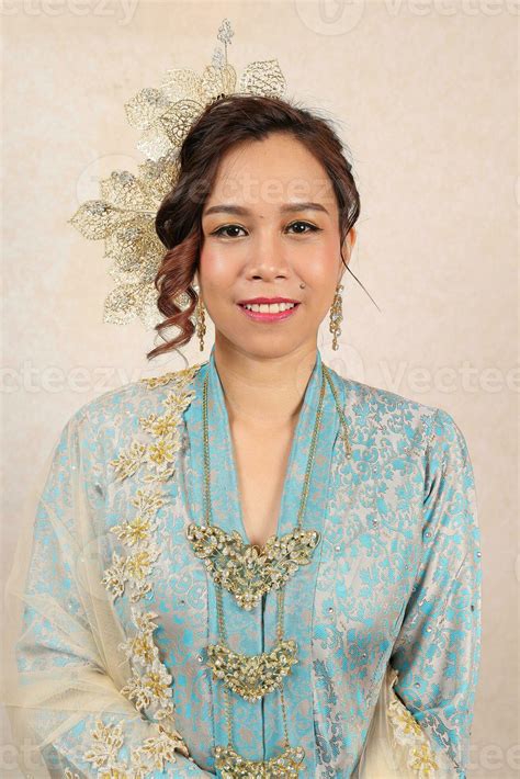 Beautiful Young Woman Wearing Mahsuri Style Baju Kebaya Labuh