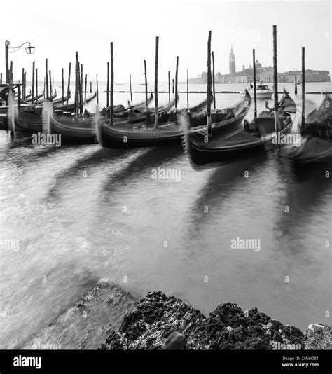 traditional gondola in Venice waterways, Italy Stock Photo - Alamy
