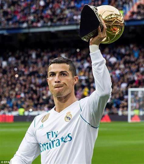 Cristiano Ronaldo Poses With His Five Ballon D Ors Daily Mail Online