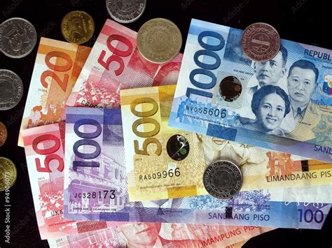 Philippine peso bills and coins Stock Photo | Adobe Stock