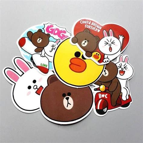 several stickers with different animals and faces on them, all in various shapes and sizes