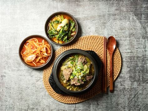 Premium Photo Galbi Soup And Various Side Dishes In A Hot Pot