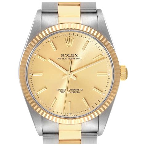 Rolex Oyster Perpetual Fluted Bezel Steel Yellow Gold Mens Watch