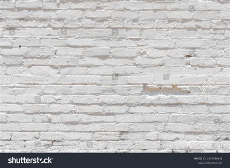 white painted brick wall dent texture stock photo  shutterstock