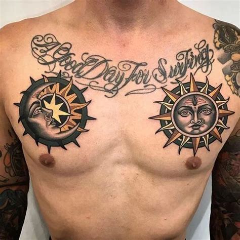 A Man With Sun And Moon Tattoos On His Chest