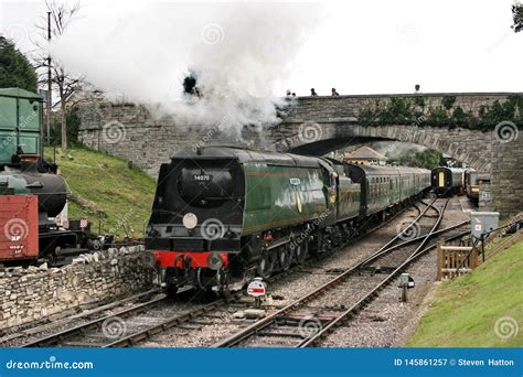 Battle Of Britain Class Steam Loco No 34070 `manston` Departs Swanage