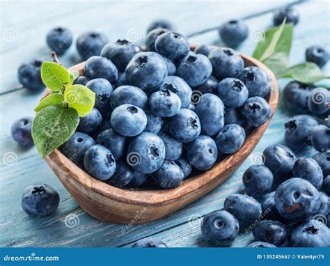 Blueberries In The Wooden Bowl On The Table Stock Image Image Of