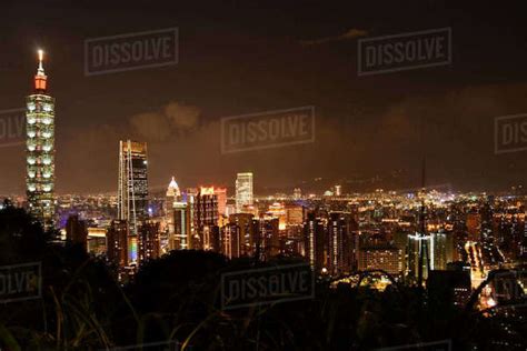 Skyline and Taipei 101 skyscraper in night Taipei, Taiwan - Stock Photo - Dissolve