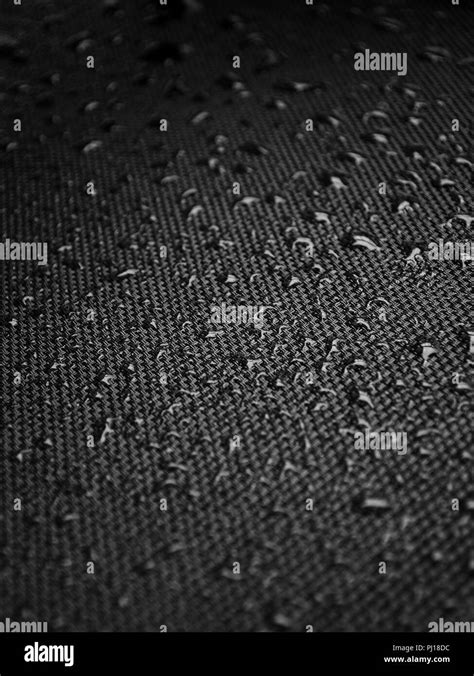 Water drops on the fabric texture. wet textile texture. cloth with ...