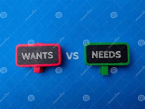 Wooden Sign Board With The Word Wants Vs Needs Stock Photo Image Of