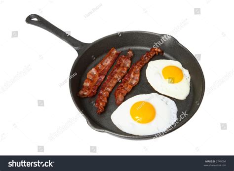 Frying Pan With Bacon And Eggs Stock Photo 2748004 Shutterstock