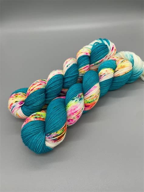 Hand Dyed Yarn Superwash Merino Wool Turquoise Fluorescent Speckled