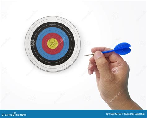 Human Hand Is Throwing The Darts Target To The Darts Board A Man`s