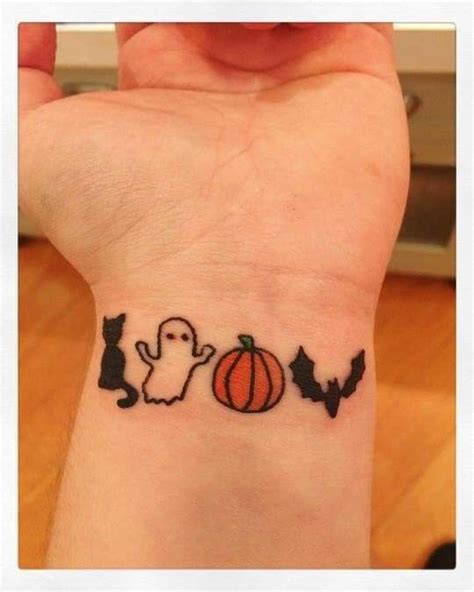 Pin By Tiffany Geis On Tattoos Cute Halloween Tattoos Wrist Tattoos