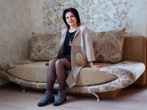 Girl Brunette Portrait Sitting On The Couch Stock Image Image Of Lifestyle Cute 209185315